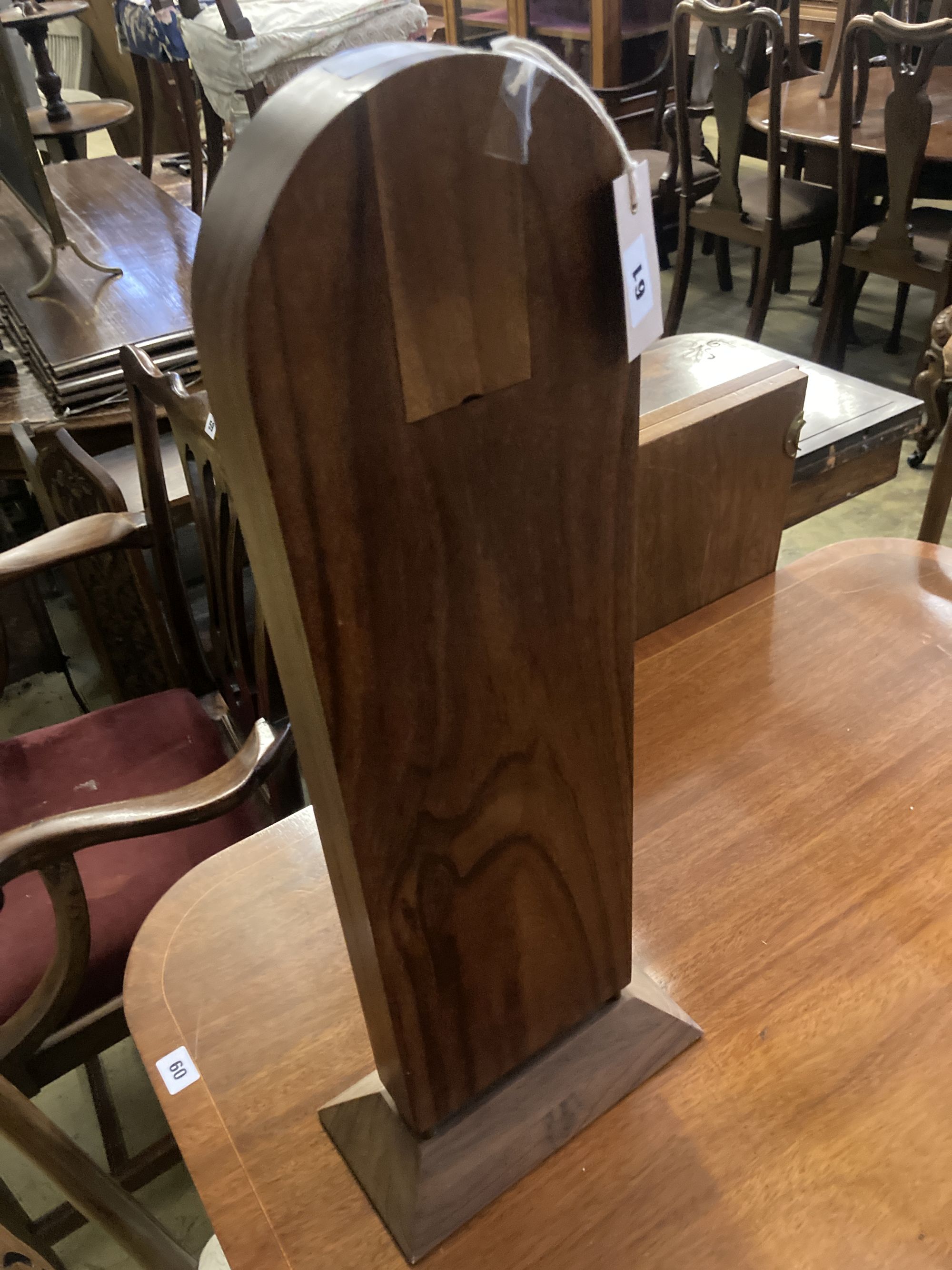 A Scandinavian design copper mounted teak mantel timepiece, height 64cm